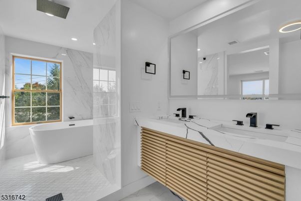Bathroom, Dual Sink Vanities, Free Standing Baths, Interior, Marble, Marble Walls, Recessed Lighting