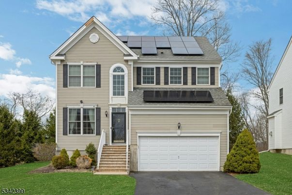 Attached, Exterior, Facade, Solar Panels, Brick Traditional