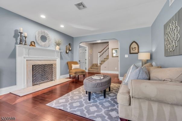 Fireplace, Interior, Living room, Recessed Lighting, Wood Texture Flooring