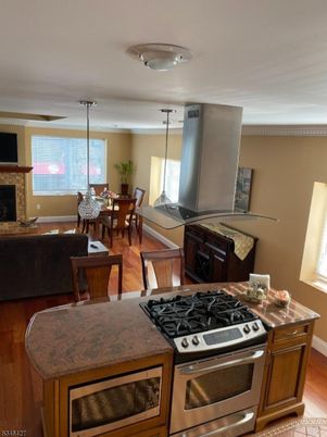 Dining room, Fireplace, Interior, Kitchen, Living room, Pendant Lights, Wood Texture Flooring
