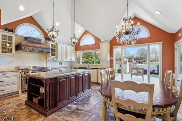 Chandelier, Dining room, Interior, Kitchen, Pendant Lights, Recessed Lighting, Stainless Steel Appliances