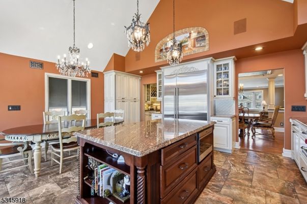 Chandelier, Dining room, Interior, Kitchen, Pendant Lights, Recessed Lighting, Stainless Steel Appliances