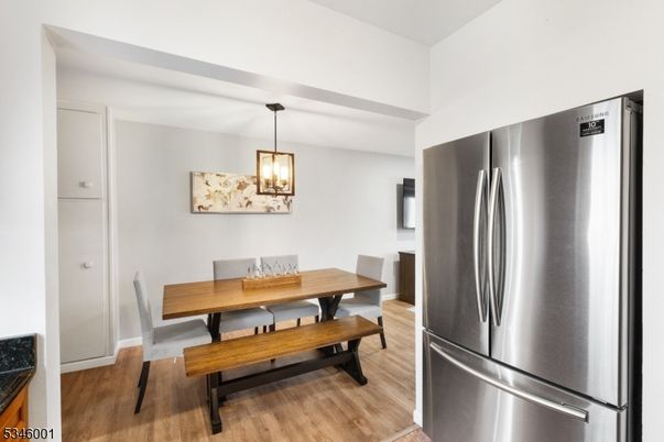 Dining room, Interior, Kitchen, Pendant Lights, Stainless Steel Appliances, Wood Texture Flooring