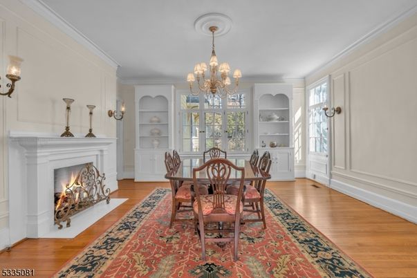 Chandelier, Dining room, Fireplace, Interior, Wood Texture Flooring