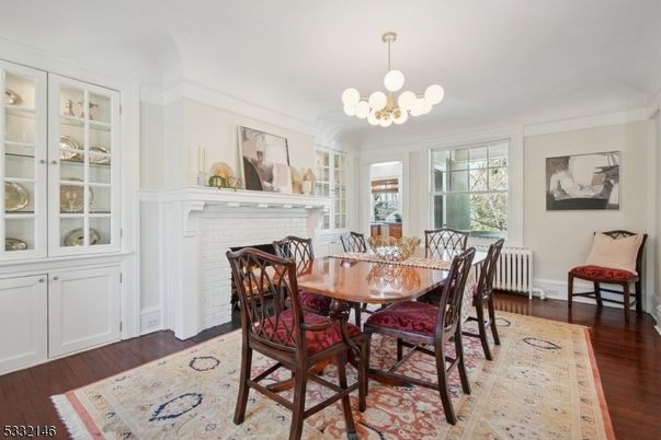 Chandelier, Dining room, Fireplace, Interior, Wood Texture Flooring