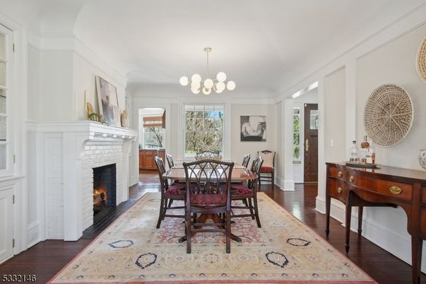 Dining room, Fireplace, Interior, Pendant Lights, Wood Texture Flooring