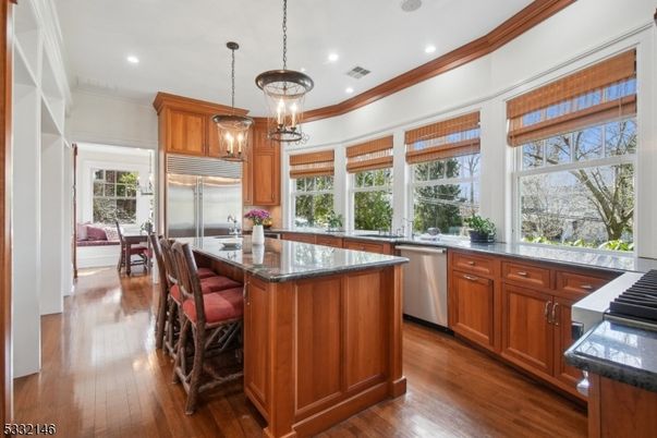 Chandelier, Interior, Kitchen, Pendant Lights, Recessed Lighting, Stainless Steel Appliances, Wood Texture Flooring