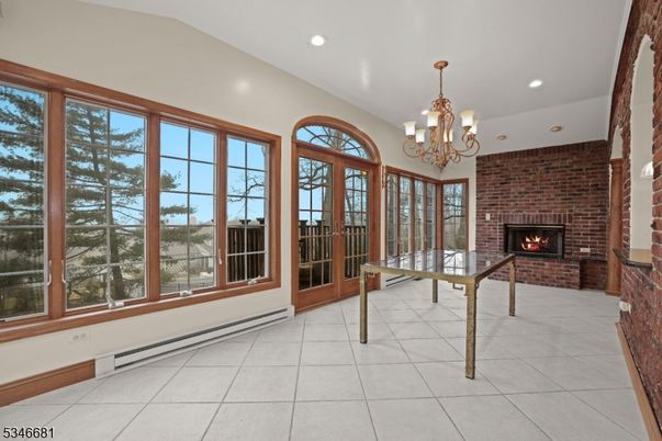 Chandelier, Fireplace, Interior, Recessed Lighting, Stone Walls