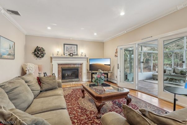 Fireplace, Interior, Living room, Recessed Lighting, Wood Texture Flooring