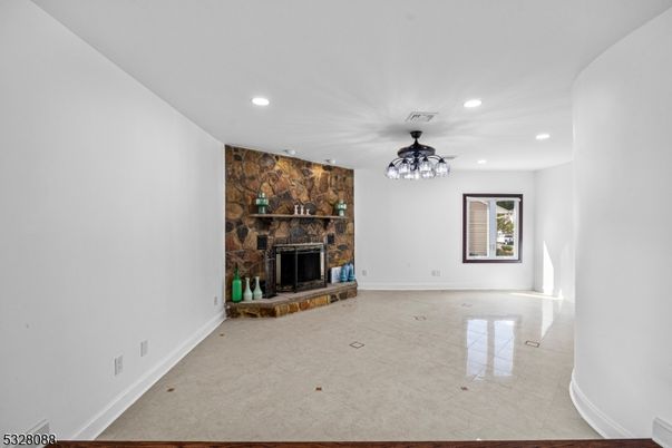 Empty room, Fireplace, Interior, Recessed Lighting, Stone Walls