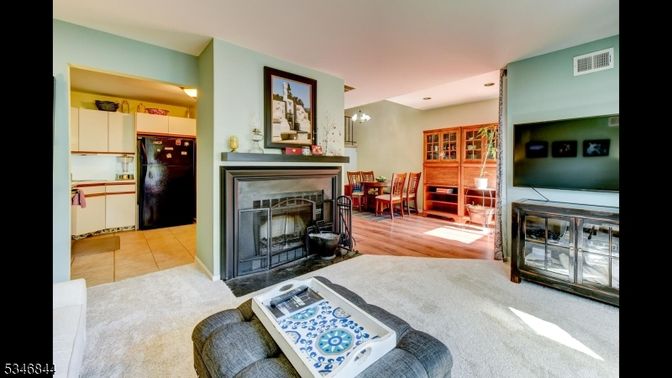 Chandelier, Dining room, Fireplace, Interior, Living room, Recessed Lighting, Wood Texture Flooring