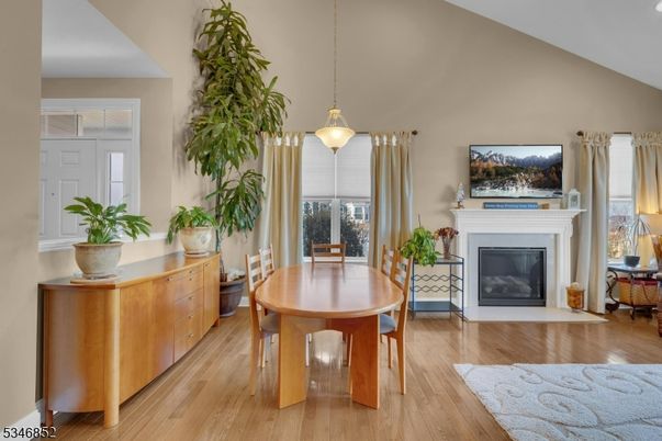 Dining room, Fireplace, Interior, Pendant Lights, Wood Texture Flooring