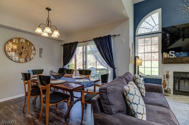Chandelier, Dining room, Fireplace, Interior, Living room, Wood Texture Flooring