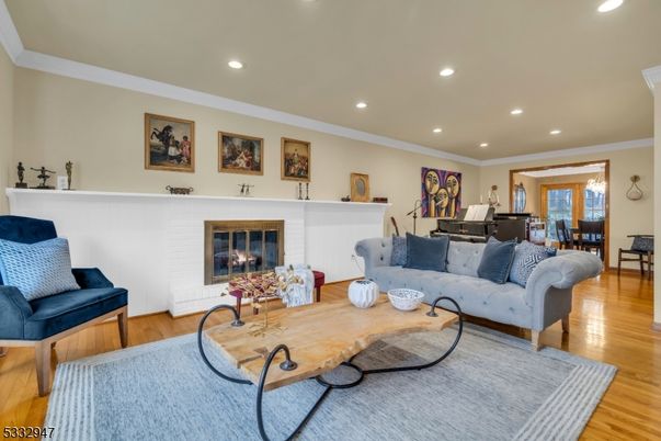 Fireplace, Interior, Living room, Piano, Recessed Lighting, Wood Texture Flooring
