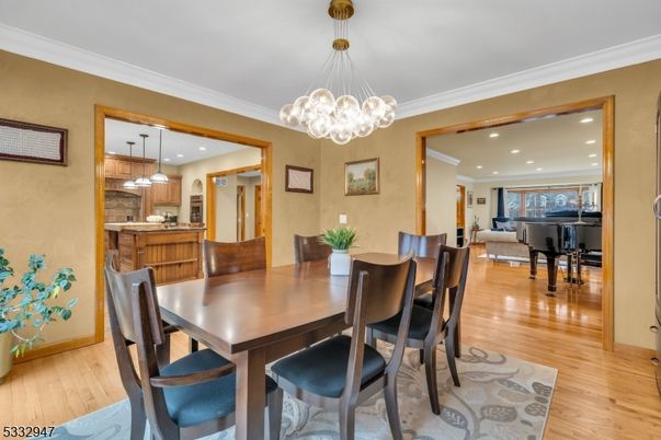 Dining room, Interior, Kitchen, Pendant Lights, Piano, Recessed Lighting, Wood Texture Flooring