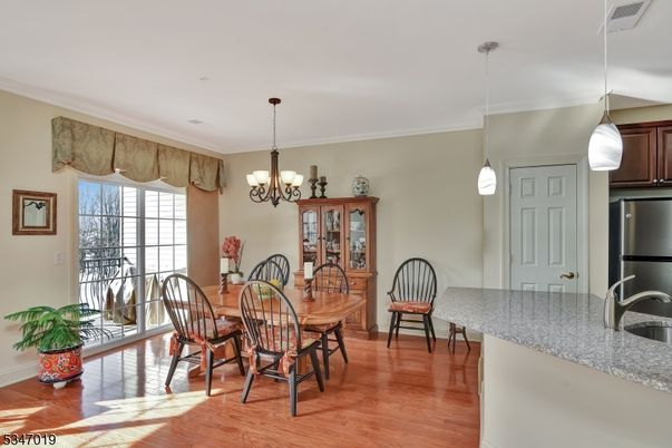 Chandelier, Dining room, Interior, Kitchen, Pendant Lights, Wood Texture Flooring