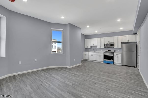 Interior, Kitchen, Recessed Lighting, Stainless Steel Appliances, Wood Texture Flooring