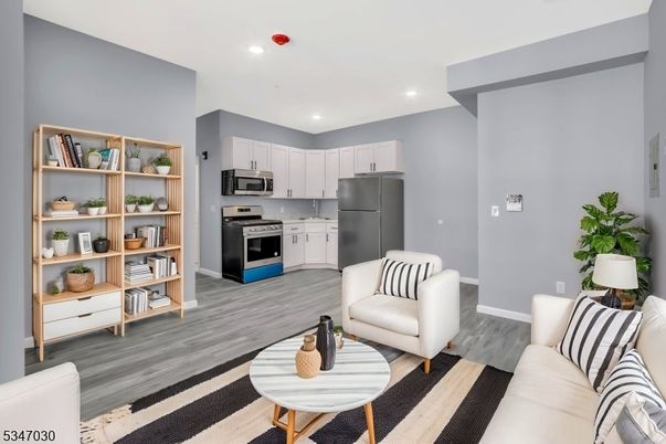 Interior, Kitchen, Living room, Recessed Lighting, Stainless Steel Appliances, Wood Texture Flooring