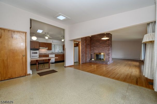 Fireplace, Interior, Kitchen, Pendant Lights, Stone Walls, Wood Texture Flooring