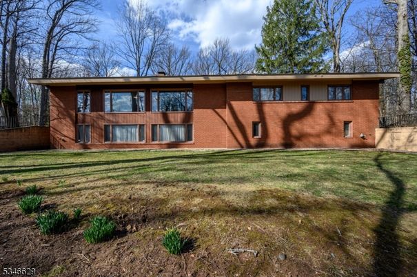 Backyard, Exterior, Facade, Brick Facade, Raised Ranch