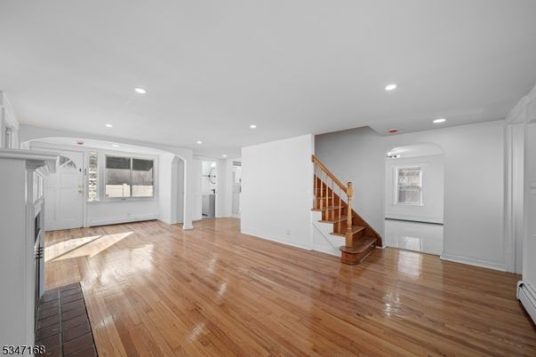 Empty room, Fireplace, Interior, Recessed Lighting, Wood Texture Flooring