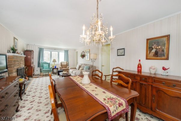Chandelier, Dining room, Fireplace, Interior, Living room