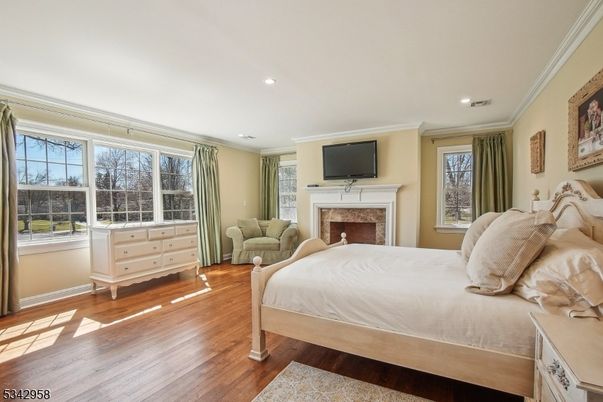 Bedroom, Fireplace, Interior, Recessed Lighting, Wood Texture Flooring