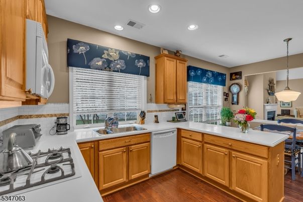 Dining room, Interior, Kitchen, Pendant Lights, Recessed Lighting, Stainless Steel Appliances, Wood Texture Flooring