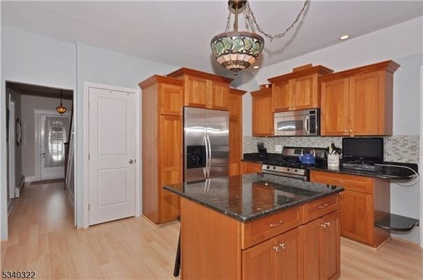 Chandelier, Interior, Kitchen, Pendant Lights, Recessed Lighting, Stainless Steel Appliances, Wood Texture Flooring