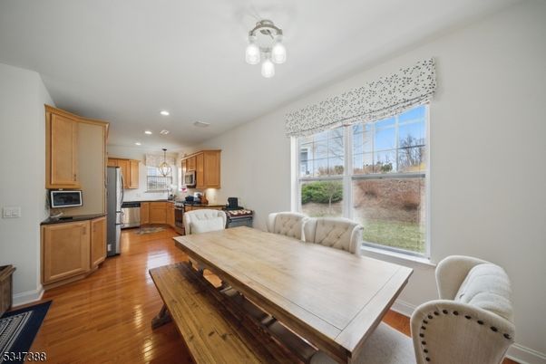 Dining room, Interior, Kitchen, Recessed Lighting, Stainless Steel Appliances, Wood Texture Flooring