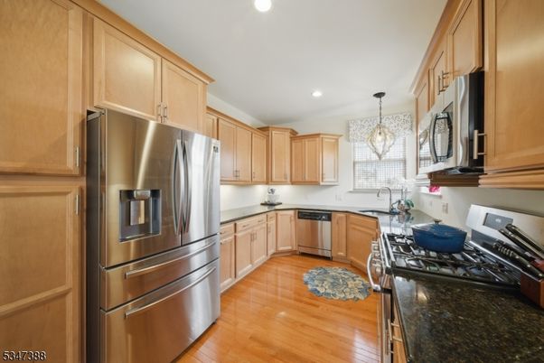 Chandelier, Interior, Kitchen, Pendant Lights, Recessed Lighting, Stainless Steel Appliances, Wood Texture Flooring