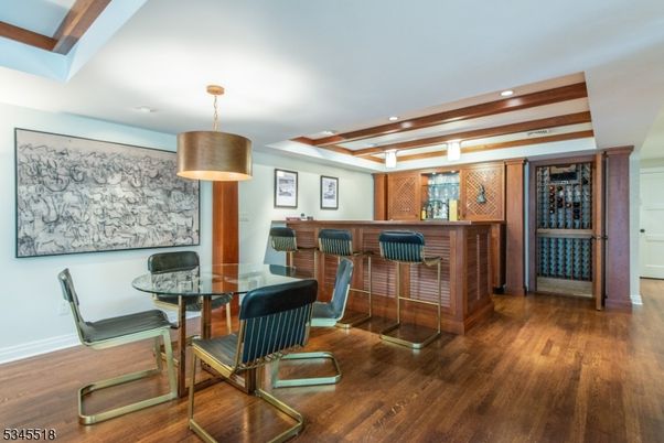 Dining room, Interior, Pendant Lights, Recessed Lighting, Wine Storage, Wooden Beams, Wood Texture Flooring