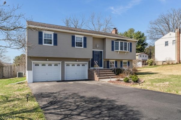 Attached, Exterior, Facade, Raised Ranch
