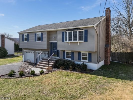 Attached, Exterior, Facade, Raised Ranch