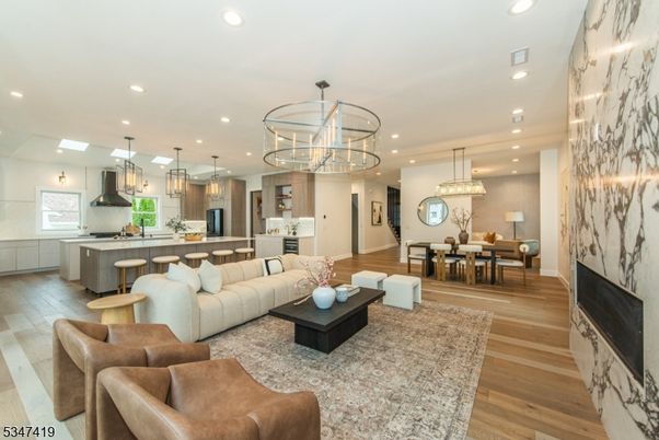 Chandelier, Dining room, Interior, Kitchen, Living room, Pendant Lights, Recessed Lighting, Wood Texture Flooring