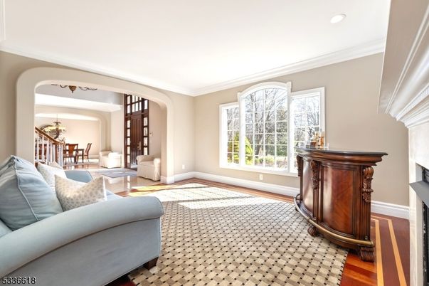 Chandelier, Dining room, Fireplace, Interior, Living room, Recessed Lighting, Wood Texture Flooring