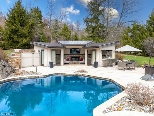 Exterior, Pool, Solar Panels
