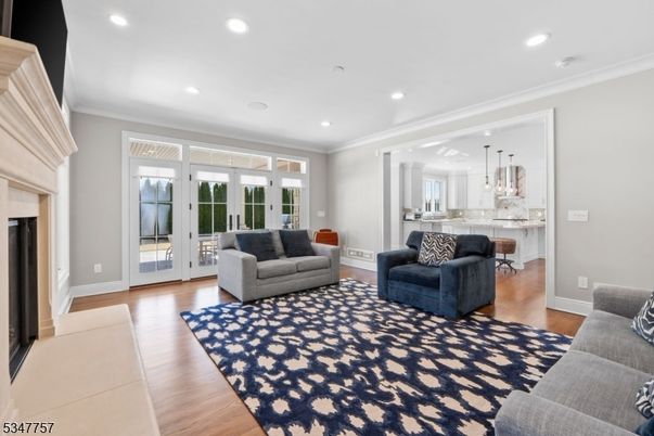 Fireplace, Interior, Kitchen, Living room, Pendant Lights, Recessed Lighting, Wood Texture Flooring