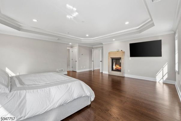Bedroom, Fireplace, Interior, Recessed Lighting, Wood Texture Flooring