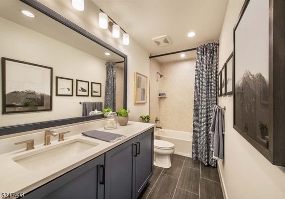 Bathroom, Dual Sink Vanities, Interior, Recessed Lighting, Wood Texture Flooring
