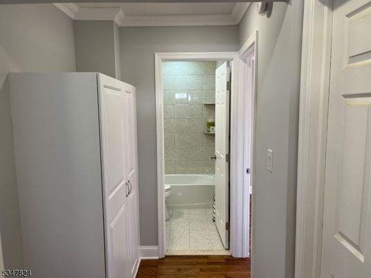 Bathroom, Glass Shower, Interior, Marble, Marble Walls, Wood Texture Flooring