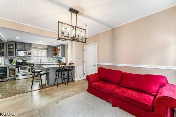 Interior, Kitchen, Living room, Pendant Lights, Recessed Lighting, Stainless Steel Appliances, Wood Texture Flooring