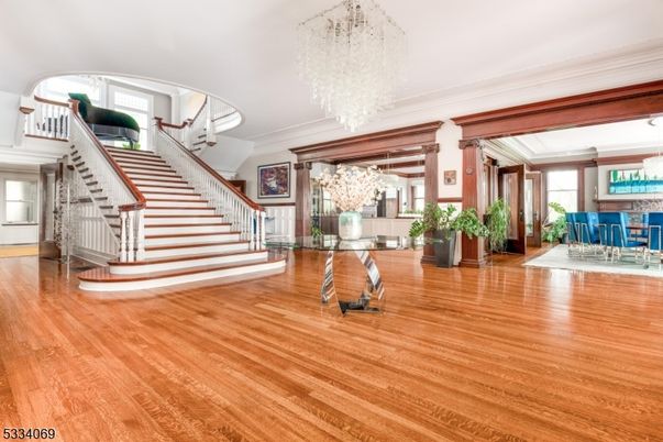 Chandelier, Dining room, Interior, Piano, Wood Texture Flooring