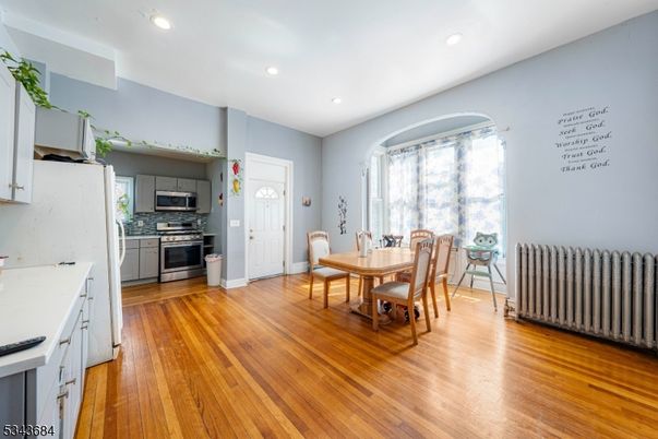 Dining room, Interior, Kitchen, Recessed Lighting, Stainless Steel Appliances, Wood Texture Flooring