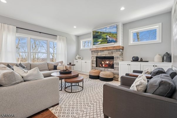 Fireplace, Interior, Living room, Recessed Lighting, Wood Texture Flooring