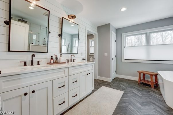 Bathroom, Dual Sink Vanities, Free Standing Baths, Interior, Recessed Lighting, Wood Texture Flooring