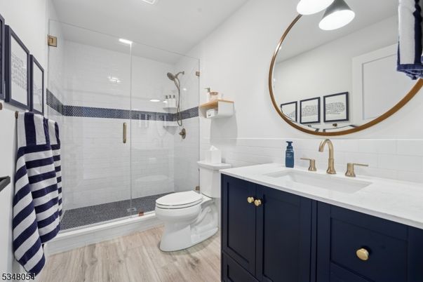 Bathroom, Glass Shower, Interior, Recessed Lighting, Wood Texture Flooring