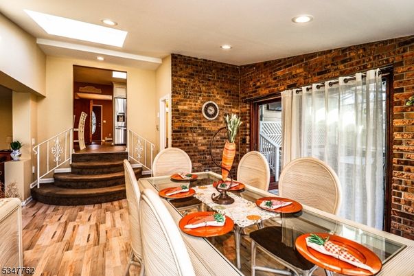 Dining room, Interior, Recessed Lighting, Stone Walls, Wood Texture Flooring