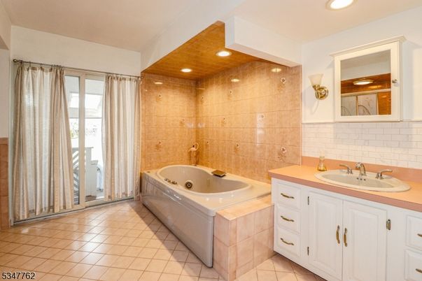 Bathroom, Dual Sink Vanities, Interior, Recessed Lighting, Wooden Ceilings, Wooden Walls