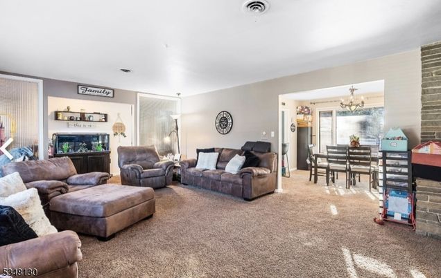 Chandelier, Dining room, Fireplace, Interior, Living room